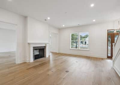 Open living room with fireplace of the Doubler floor plan