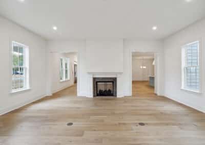 Open living room with fireplace of the Doubler floor plan