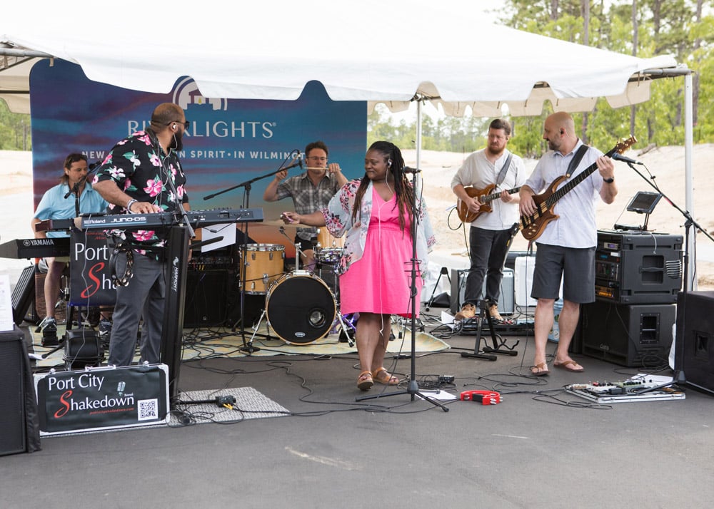 Band playing during the 2023 Parade of Homes event at Riverlights